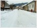 Letná ulica v zime od budovy gymnázia